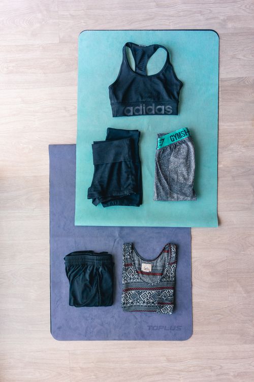 Flat lay showing how to care for activewear before washing