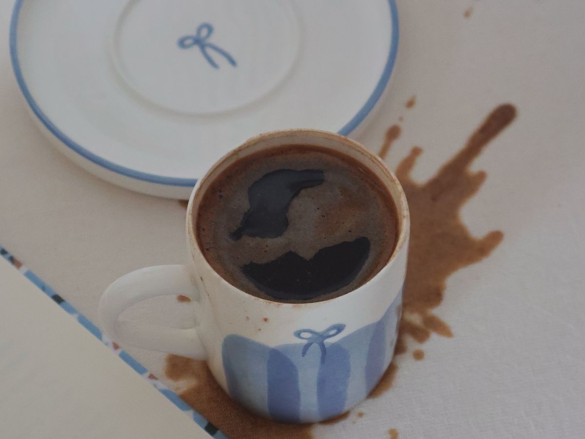 A coffee spill on fabric showing how to remove coffee stains fast