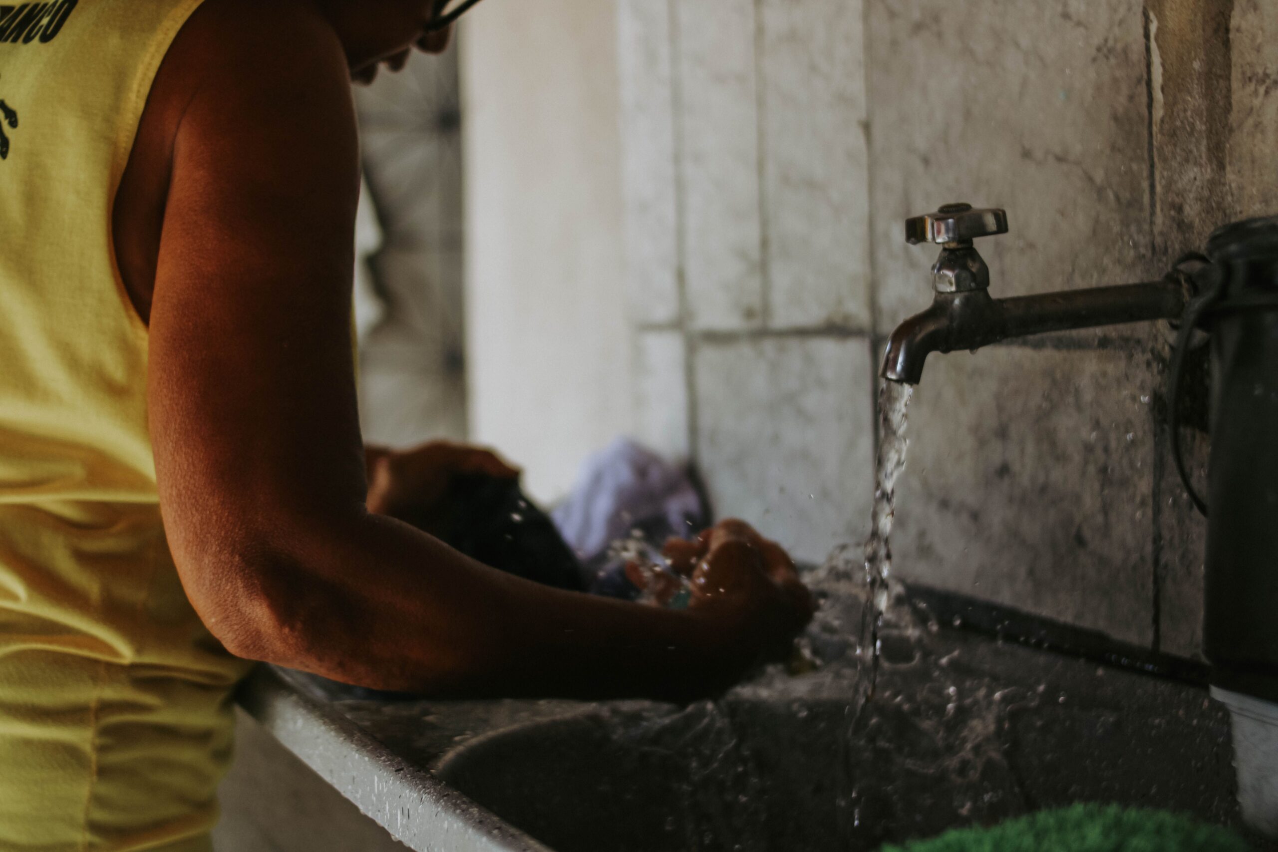 Washing clothes in a basin when doing laundry without a washing machine