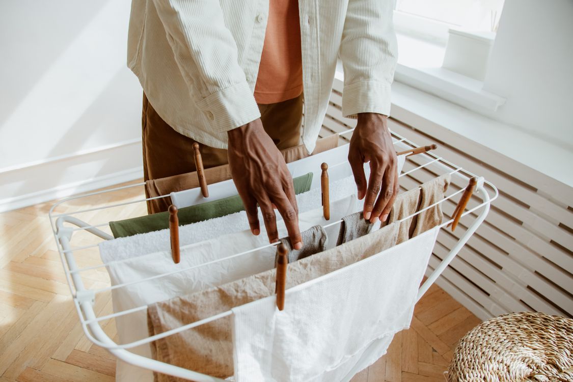 Hanging washed laundry to dry clothes indoors with good airflow