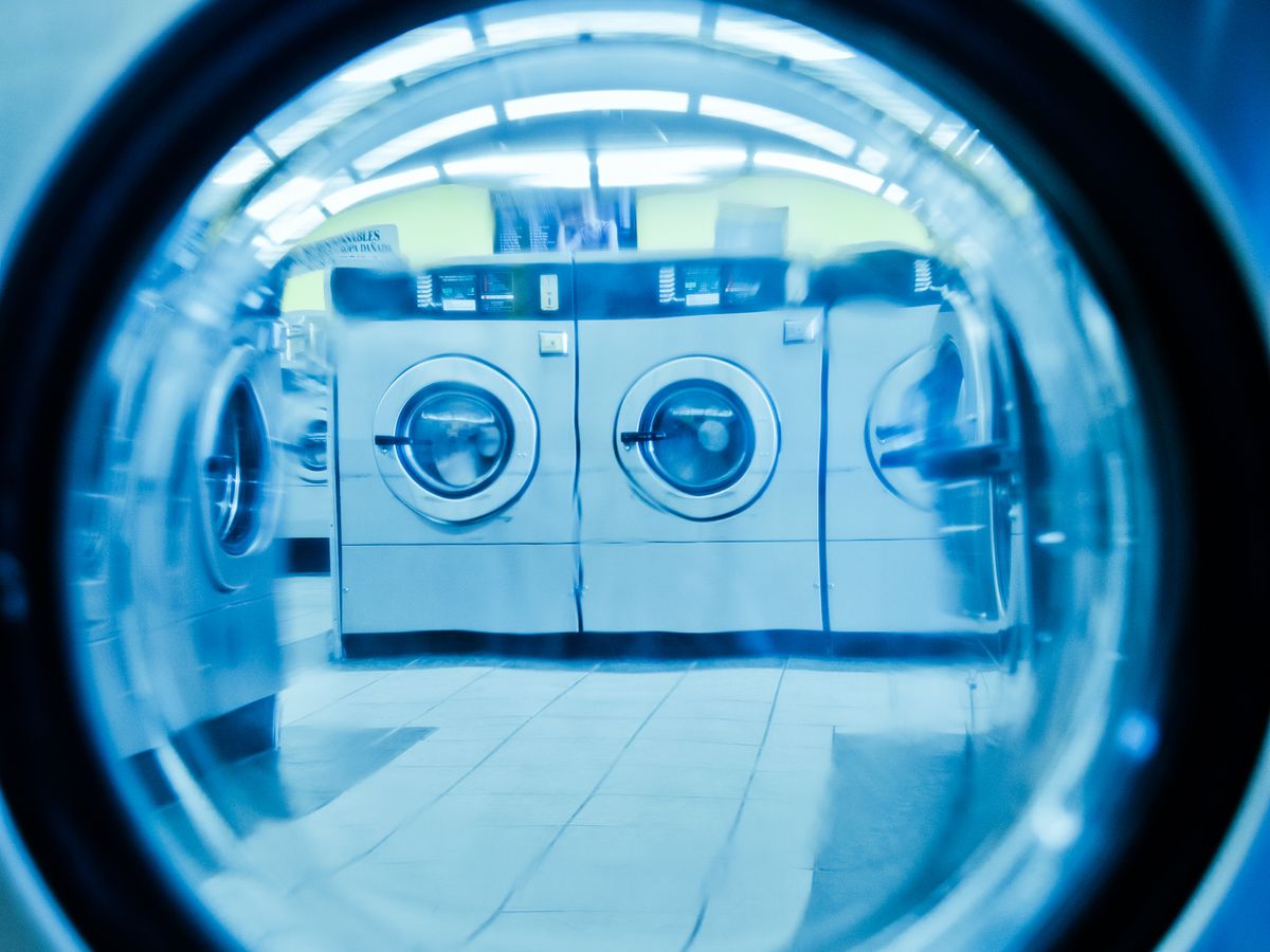 A row of laundromat washers used at different water temperatures