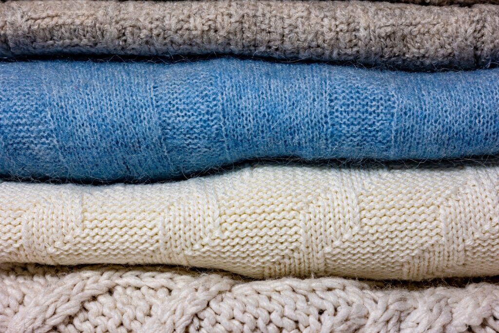 Neat stack of folded sweaters