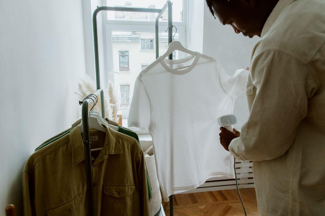 Caring for a white shirt on a rack after stain treatment