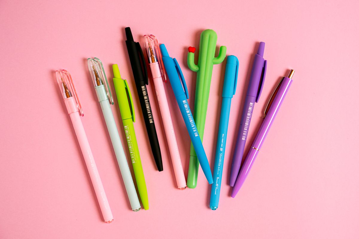 Collection of colorful pens showing different types of ink
